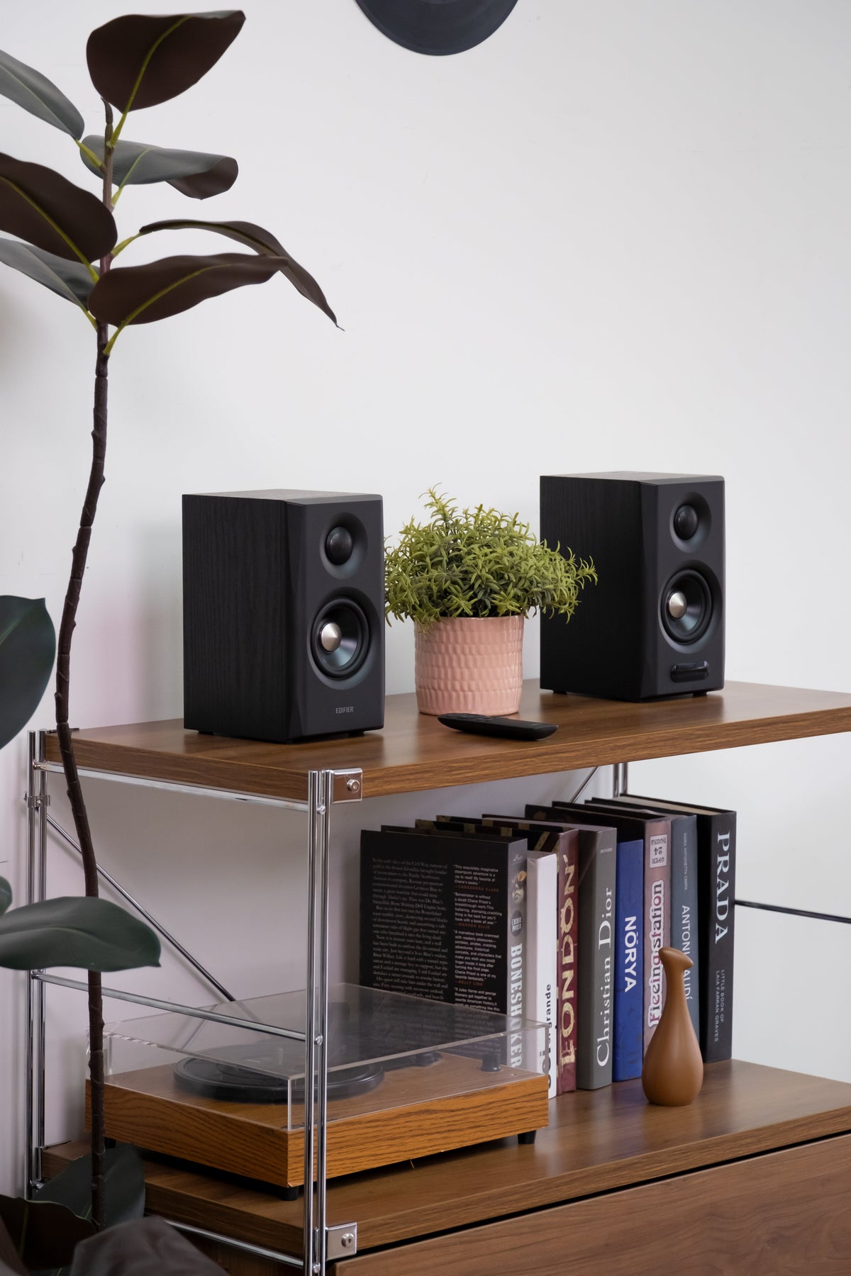 EDIFIER S355DB Black 2.1 speaker system satellite speakers on a media shelf