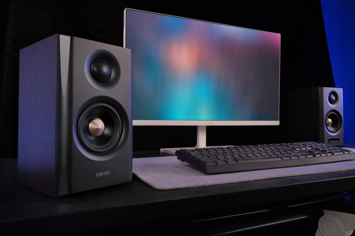EDIFIER S355DB Walnut 2.1 speaker system satellite speaker and subwoofer in a gaming setup