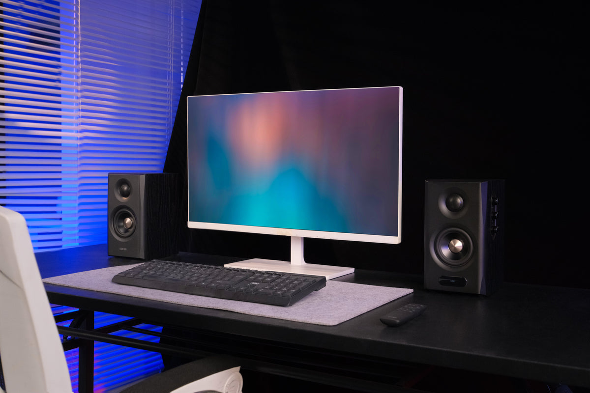 EDIFIER S355DB Black 2.1 speaker system on a gaming desk
