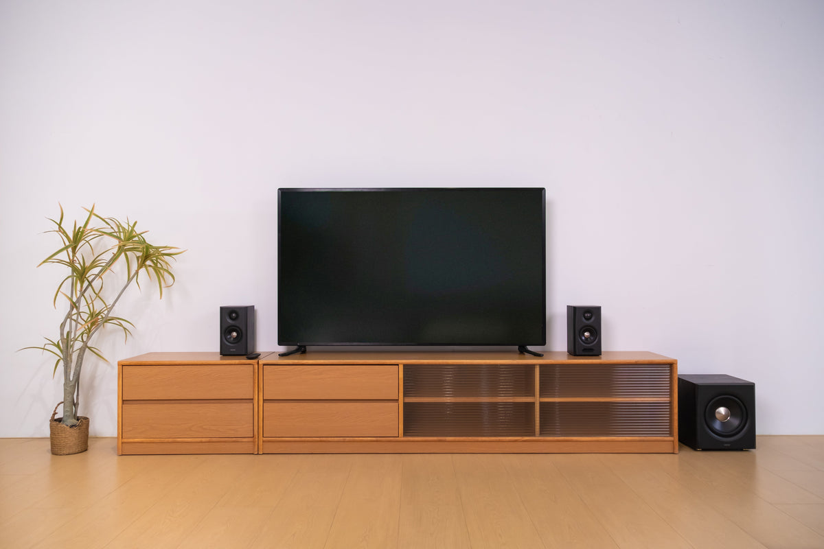 EDIFIER S355DB Black 2.1 speaker system in a living room TV setup