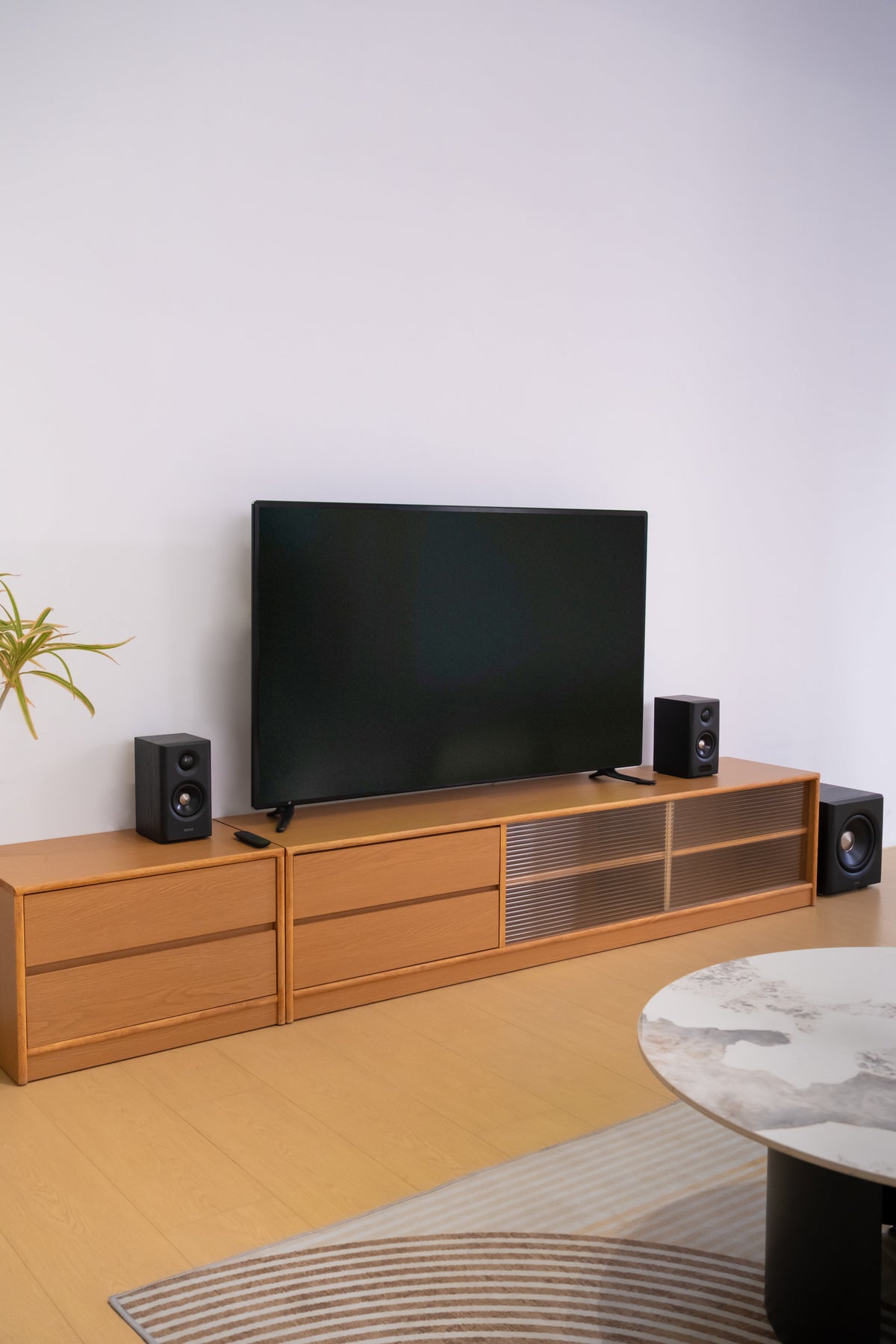 EDIFIER S355DB Black 2.1 speaker system in a modern living room