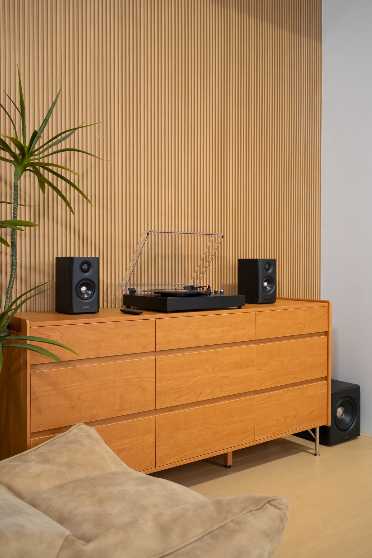 EDIFIER S355DB Black 2.1 speaker system on a turntable cabinet